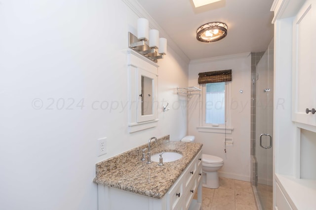 bathroom with crown molding, toilet, vanity, and walk in shower