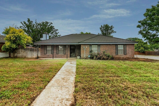 6700 Deer Park Dr, Amarillo, TX 79124 - view of front of house with a chimney and brick siding