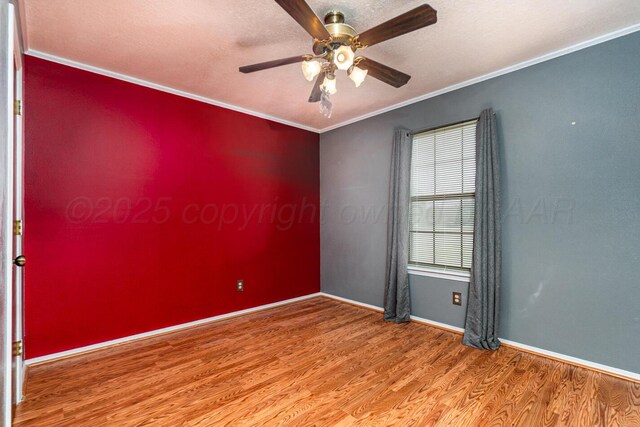 6700 Deer Park Dr, Amarillo, TX 79124 - empty room featuring wood finished floors, ceiling fan, ornamental molding, and baseboards