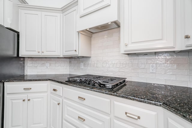 kitchen featuring black appliances, backsplash, white cabinets, and custom range hood