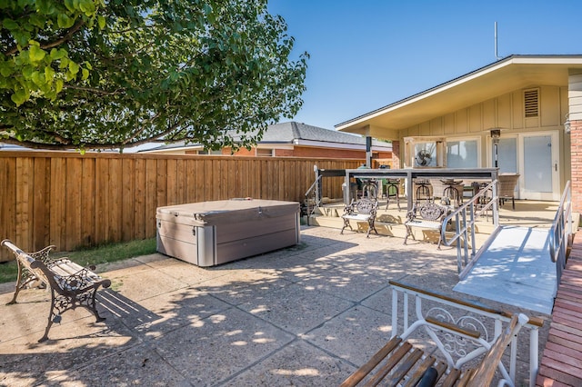 1726 Fir St, Pampa, TX 79065 - view of patio / terrace featuring a hot tub
