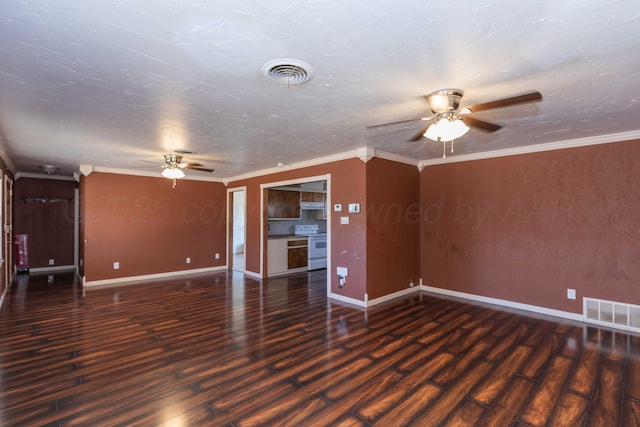 unfurnished room featuring visible vents, crown molding, and wood finished floors