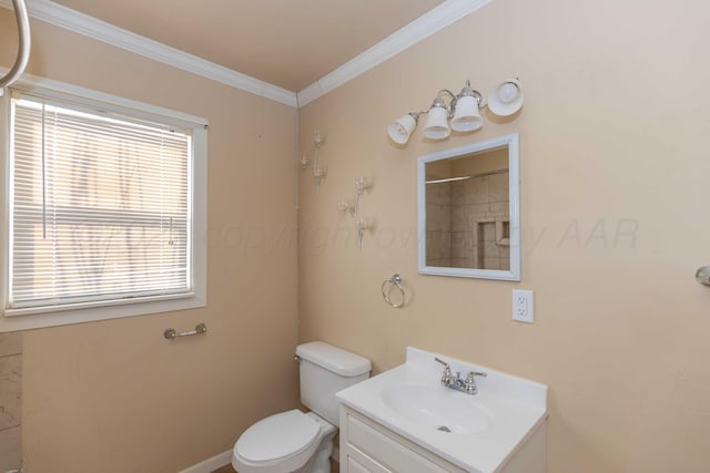 bathroom with toilet, a shower, ornamental molding, and vanity