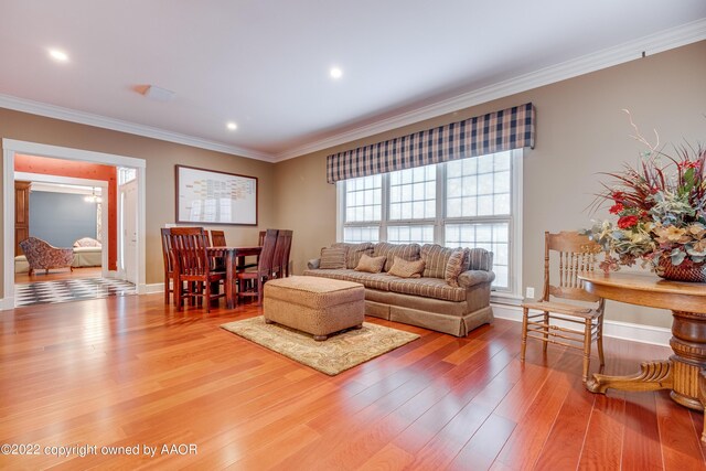 2223 S Ong St, Amarillo, TX 79109 - living area featuring ornamental molding, wood finished floors, and recessed lighting