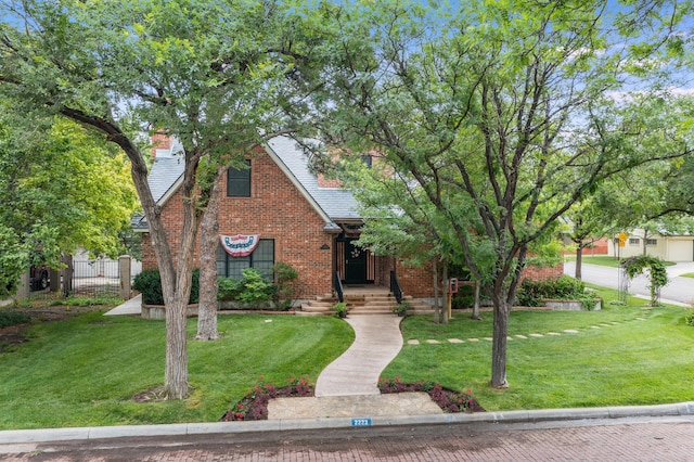 2223 S Ong St, Amarillo, TX 79109 - view of front of property with brick siding, a chimney, and roof with shingles