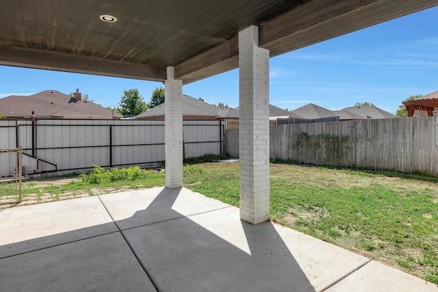 6809 Fanchun St, Amarillo, TX 79119 - fenced backyard featuring a patio area