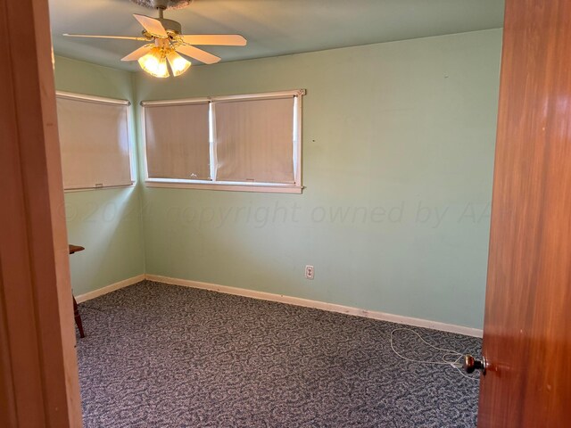 carpeted empty room featuring ceiling fan