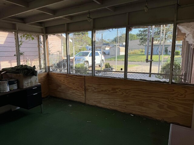 unfurnished sunroom with a healthy amount of sunlight