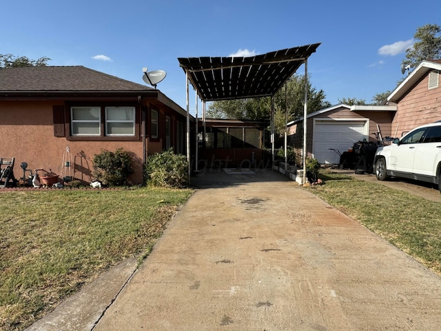 view of property exterior with a garage, a lawn, an outbuilding, and a carport