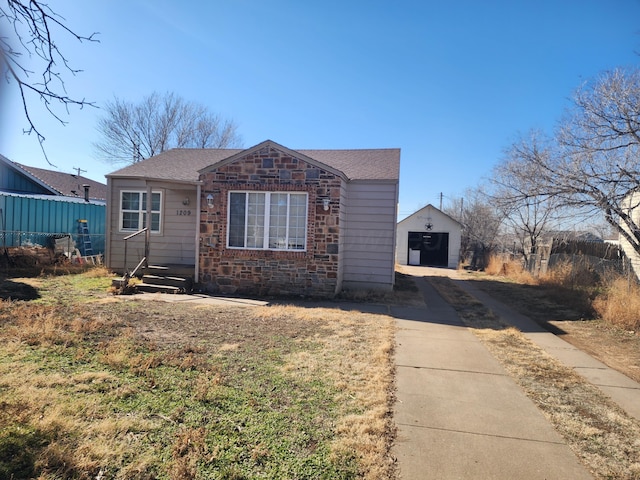 view of front of house featuring an outbuilding and a garage