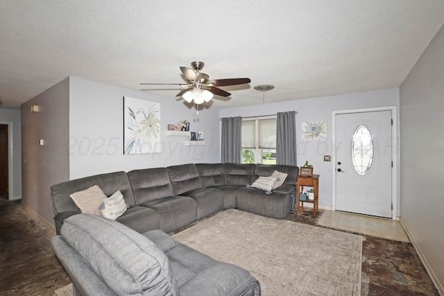 2901 Carter St, Amarillo, TX 79103 - living area with ceiling fan, baseboards, and a textured ceiling