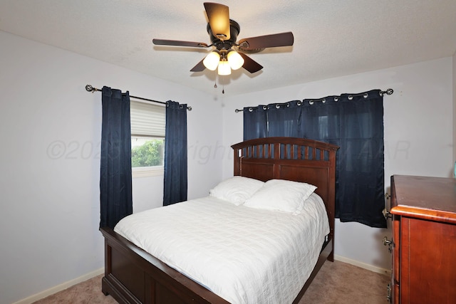 2901 Carter St, Amarillo, TX 79103 - bedroom featuring baseboards, light carpet, and ceiling fan