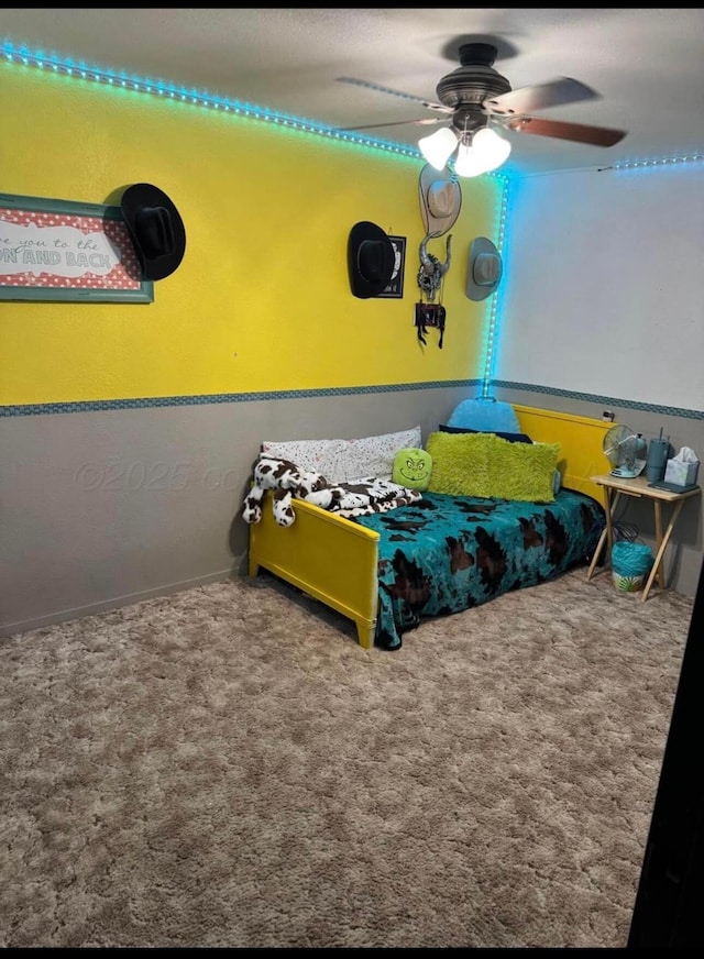 100 Bunavista St, Borger, TX 79007 - carpeted bedroom featuring ceiling fan