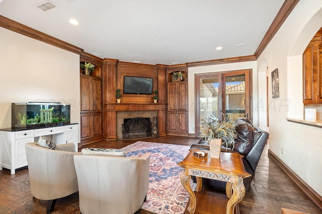 living room featuring crown molding and dark wood-type flooring