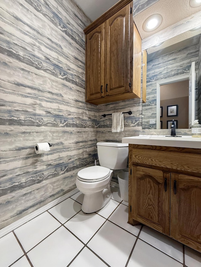 8 Glenbrook Dr, Borger, TX 79007 - half bath featuring wood walls, vanity, and tile patterned floors