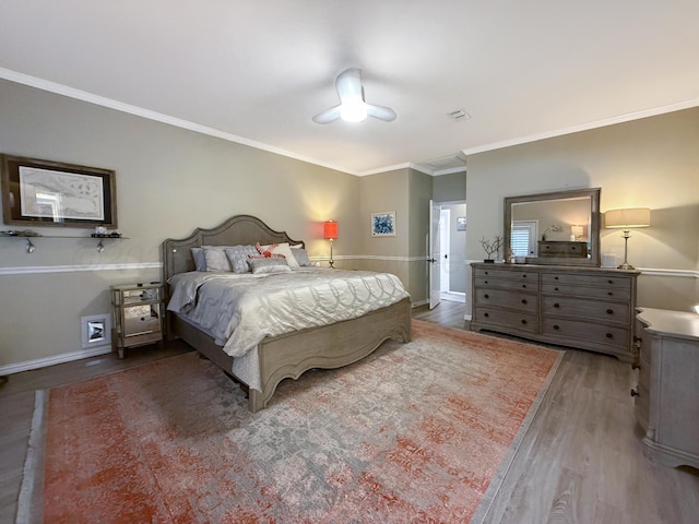 8 Glenbrook Dr, Borger, TX 79007 - bedroom with crown molding, wood finished floors, and ceiling fan