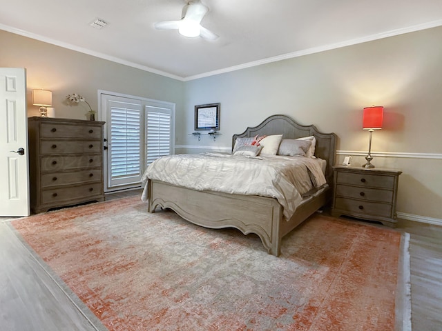 8 Glenbrook Dr, Borger, TX 79007 - bedroom with wood finished floors, ornamental molding, and ceiling fan