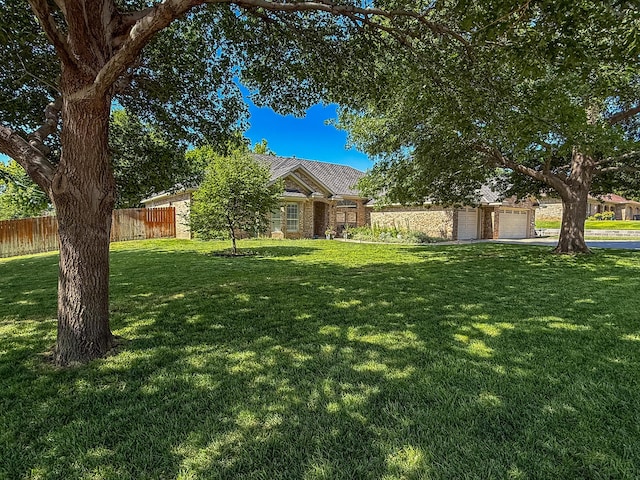 8 Glenbrook Dr, Borger, TX 79007 - view of front of property with a garage