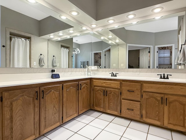8 Glenbrook Dr, Borger, TX 79007 - full bath featuring double vanity, tile patterned floors, and recessed lighting