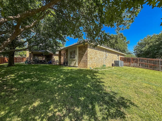 8 Glenbrook Dr, Borger, TX 79007 - view of side of property featuring brick siding and a fenced backyard