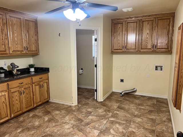 clothes washing area featuring electric dryer hookup, ceiling fan, cabinets, and hookup for a washing machine