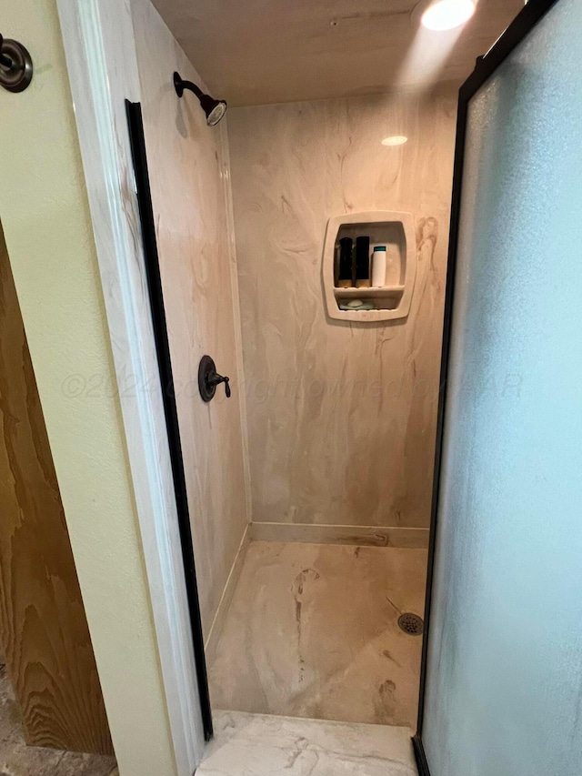 bathroom featuring a shower