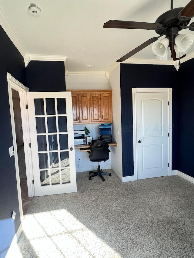 office with carpet, ceiling fan, and crown molding