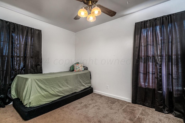 bedroom with ceiling fan and carpet