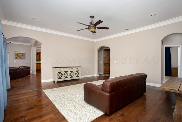 5401 Walesa Ct, Amarillo, TX 79119 - living area featuring arched walkways, a ceiling fan, dark wood-style flooring, and crown molding