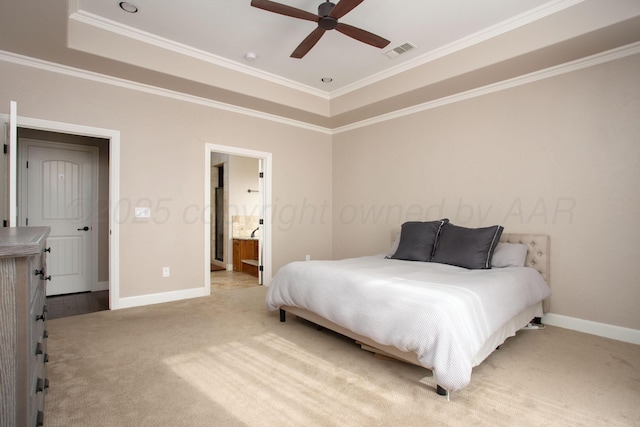 5401 Walesa Ct, Amarillo, TX 79119 - bedroom featuring ornamental molding, light colored carpet, a raised ceiling, ensuite bath, and ceiling fan