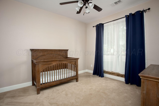 5401 Walesa Ct, Amarillo, TX 79119 - bedroom featuring light colored carpet and a ceiling fan