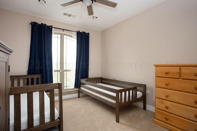 5401 Walesa Ct, Amarillo, TX 79119 - bedroom featuring light colored carpet and a ceiling fan