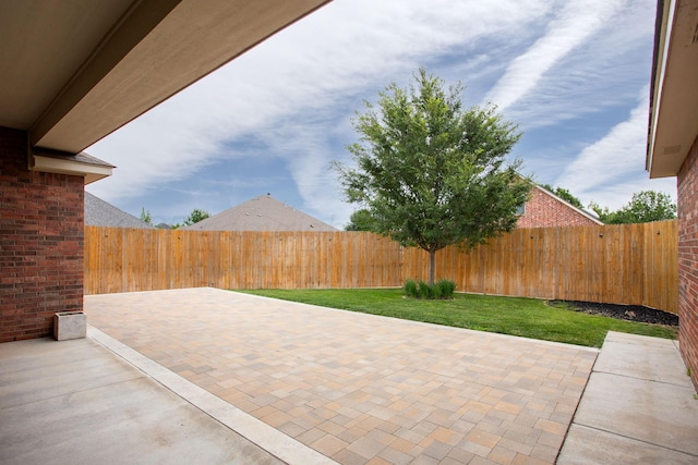5401 Walesa Ct, Amarillo, TX 79119 - fenced backyard featuring a patio