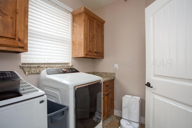 5401 Walesa Ct, Amarillo, TX 79119 - laundry room featuring separate washer and dryer and cabinet space