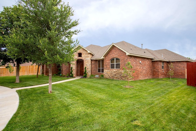 5401 Walesa Ct, Amarillo, TX 79119 - view of front of property with brick siding, roof with shingles, and stone siding