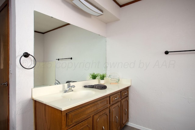 7408 Sleepy Hollow Blvd, Amarillo, TX 79121 - bathroom featuring vanity, crown molding, and baseboards