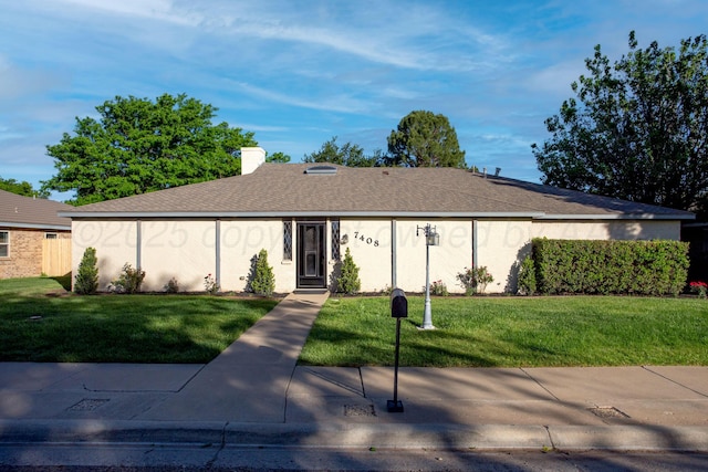 7408 Sleepy Hollow Blvd, Amarillo, TX 79121 - ranch-style home featuring a front lawn and roof with shingles