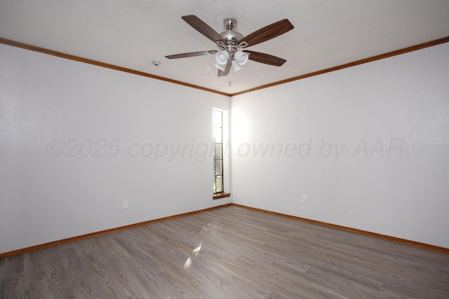 7408 Sleepy Hollow Blvd, Amarillo, TX 79121 - unfurnished room featuring wood finished floors, ornamental molding, baseboards, and a ceiling fan