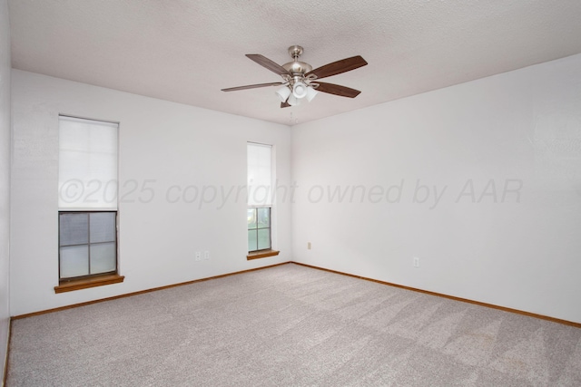 7408 Sleepy Hollow Blvd, Amarillo, TX 79121 - carpeted empty room featuring baseboards, ceiling fan, and a textured ceiling