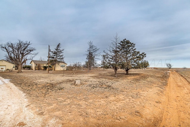 2723 County Road O, Friona, TX 79035 - view of yard featuring a rural view
