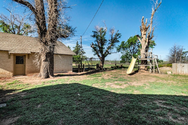 2723 County Road O, Friona, TX 79035 - view of yard featuring a playground