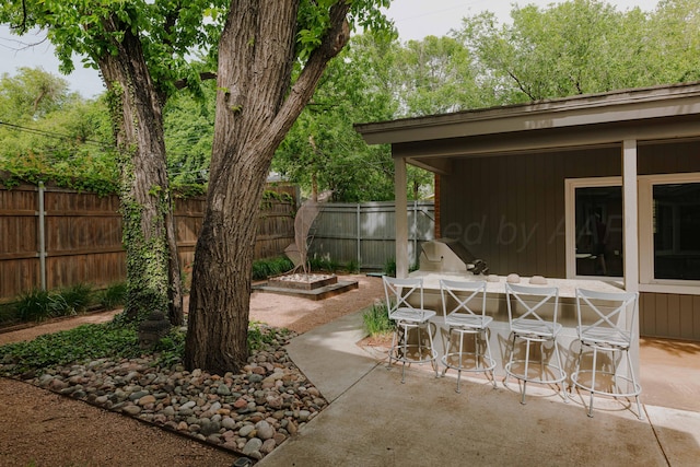 view of patio / terrace with fence