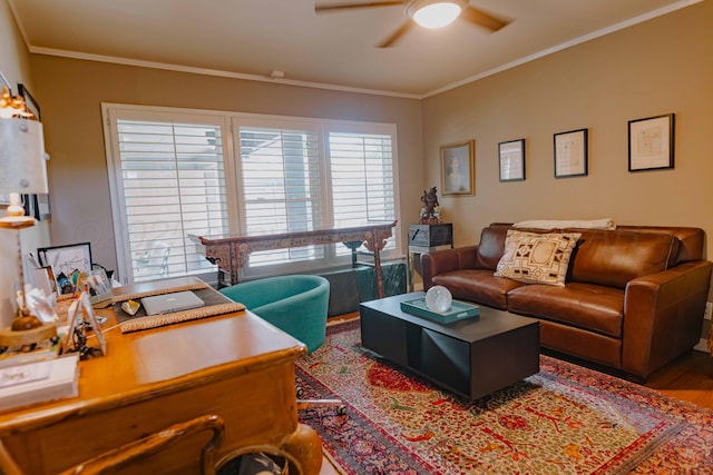 living room with ceiling fan, wood finished floors, ornamental molding, and an office area