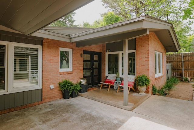 view of patio featuring fence