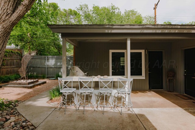 view of patio / terrace with fence