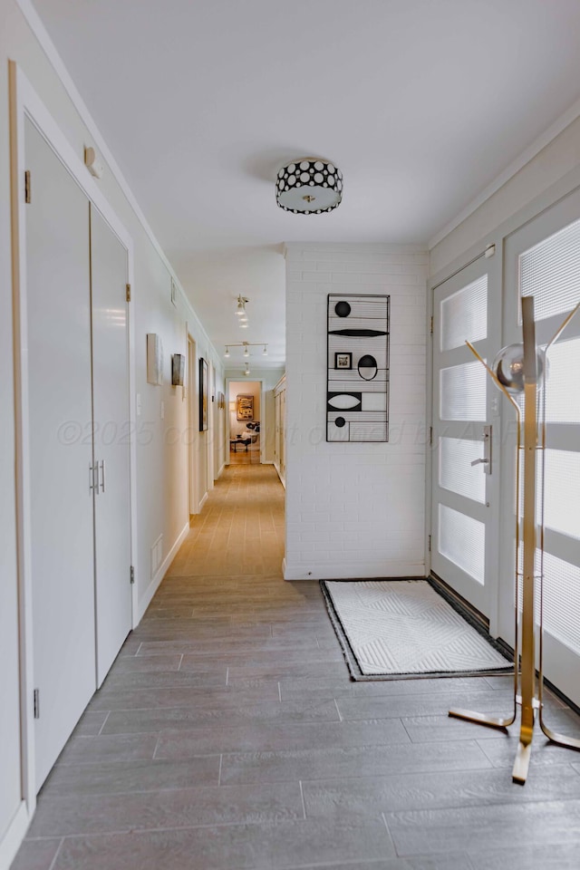 hall featuring wood finished floors