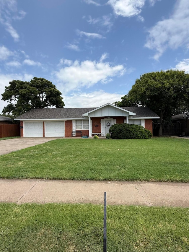 2810 Willbur Dr, Amarillo, TX 79110 - ranch-style home featuring brick siding, a garage, concrete driveway, and a shingled roof