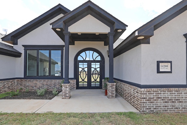 doorway to property with french doors