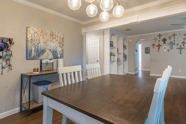 3102 S Bivins St, Amarillo, TX 79103 - dining space featuring arched walkways, dark wood-style floors, crown molding, and a chandelier