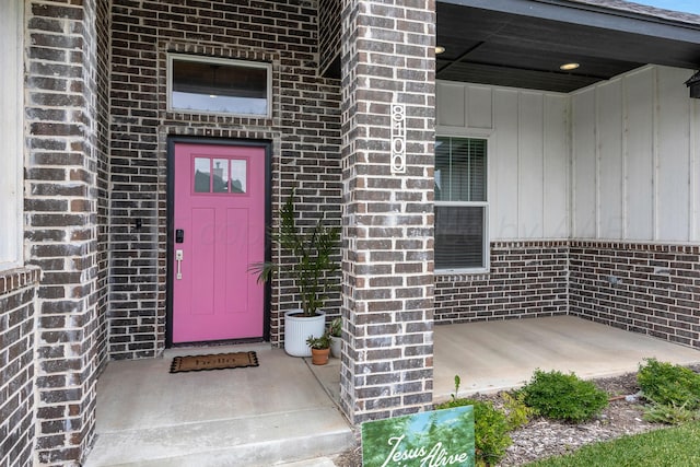8100 Pensacola Ave, Amarillo, TX 79118 - doorway to property featuring brick siding and board and batten siding
